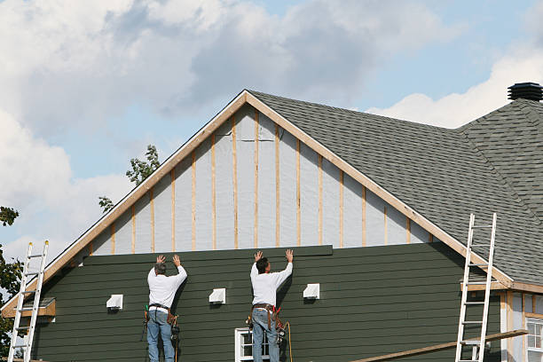 Professional Siding Contractor technician working in Torrington, CT